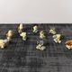 Set of 11 miniature birds in polychrome glazed ceramic.