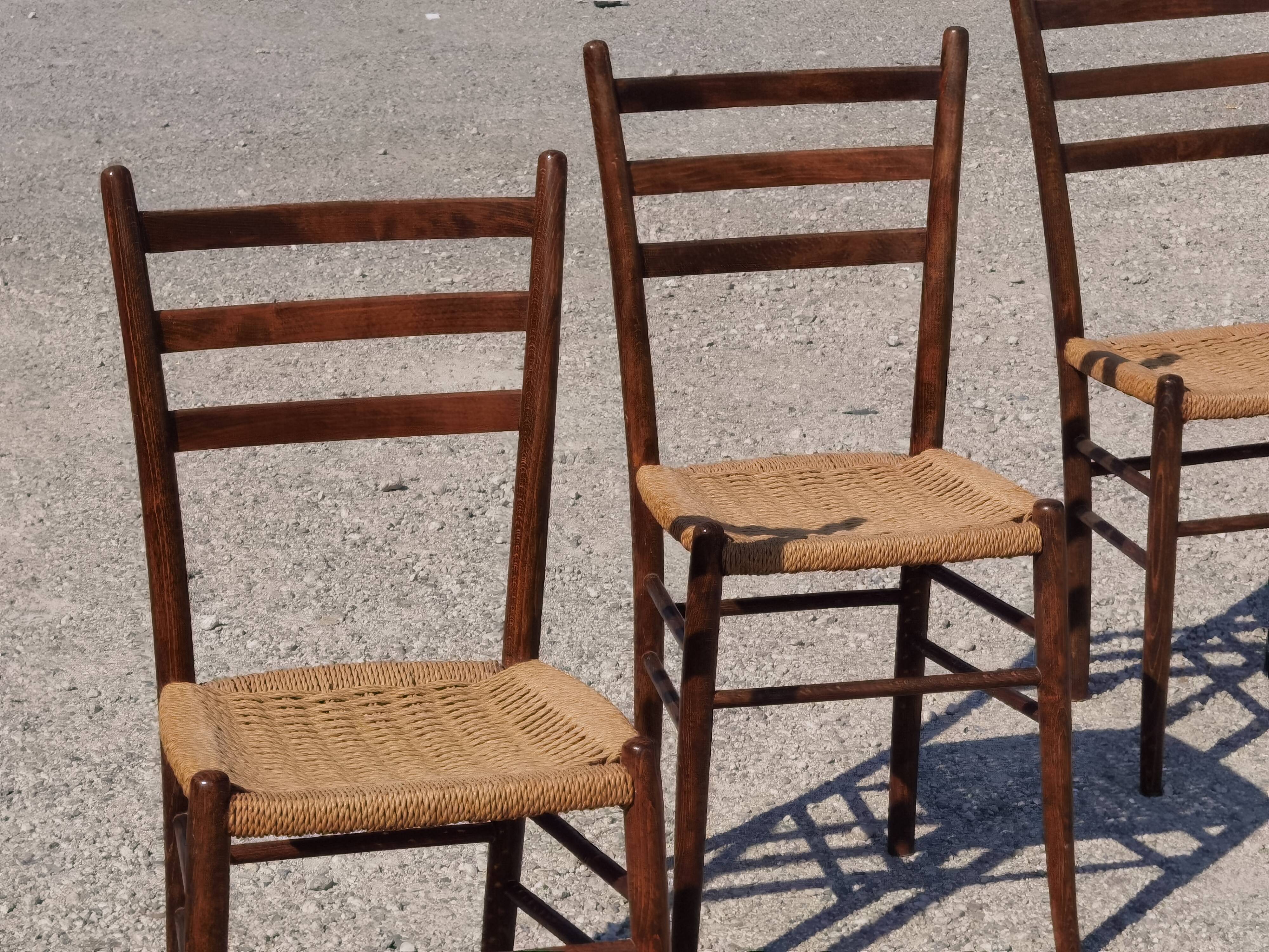 Set of 4 wooden chairs and rope