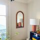 Large Scandinavian style arc wall mirror in bamboo