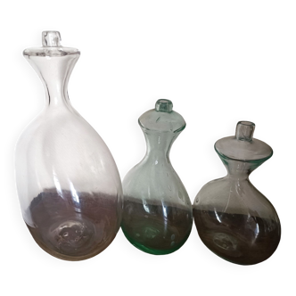 3 old shepherd bottles in blown glass