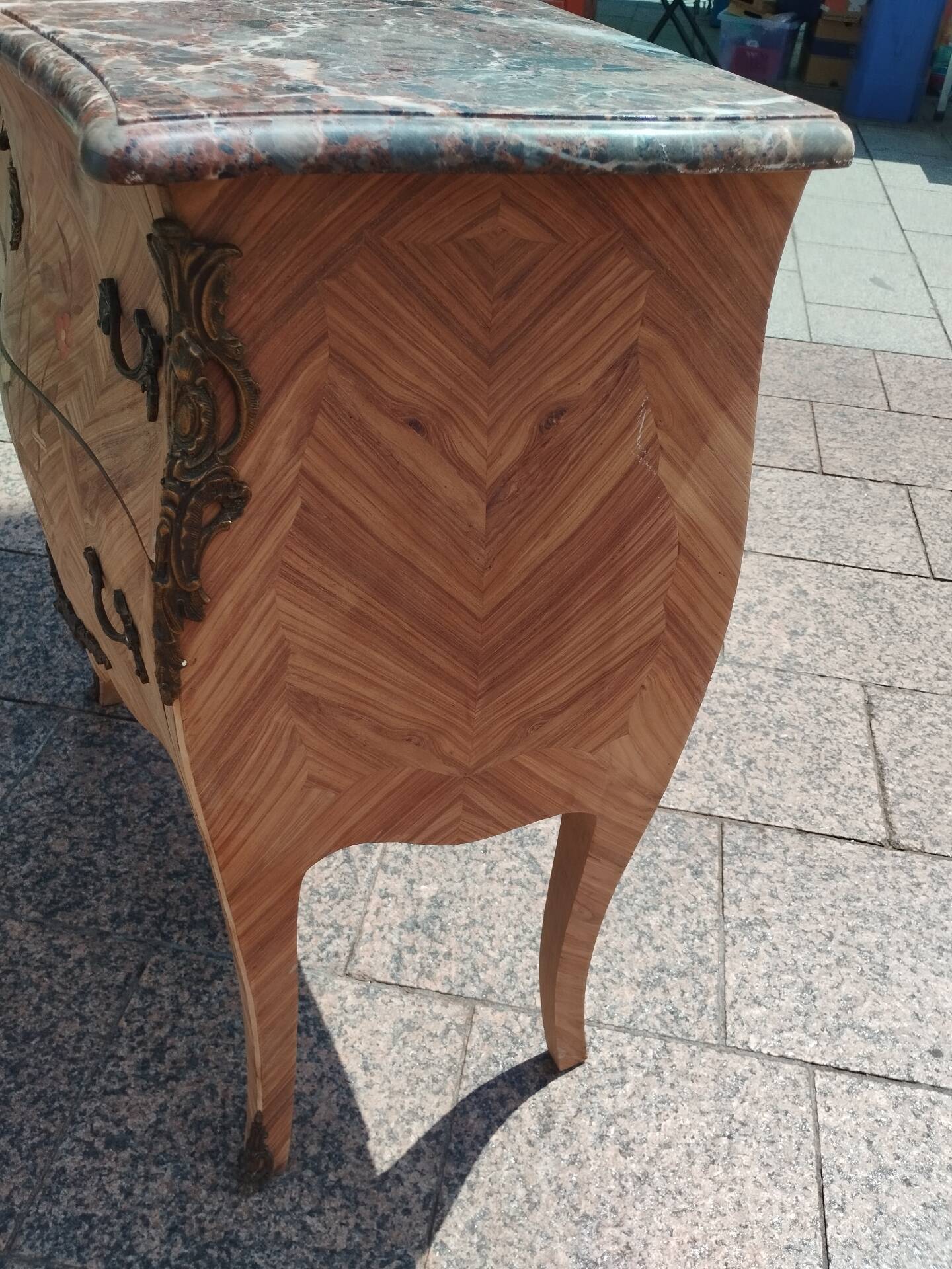 Antique commode in marquetry in the Louis XV style with a marble top.