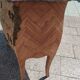 Antique commode in marquetry in the Louis XV style with a marble top.