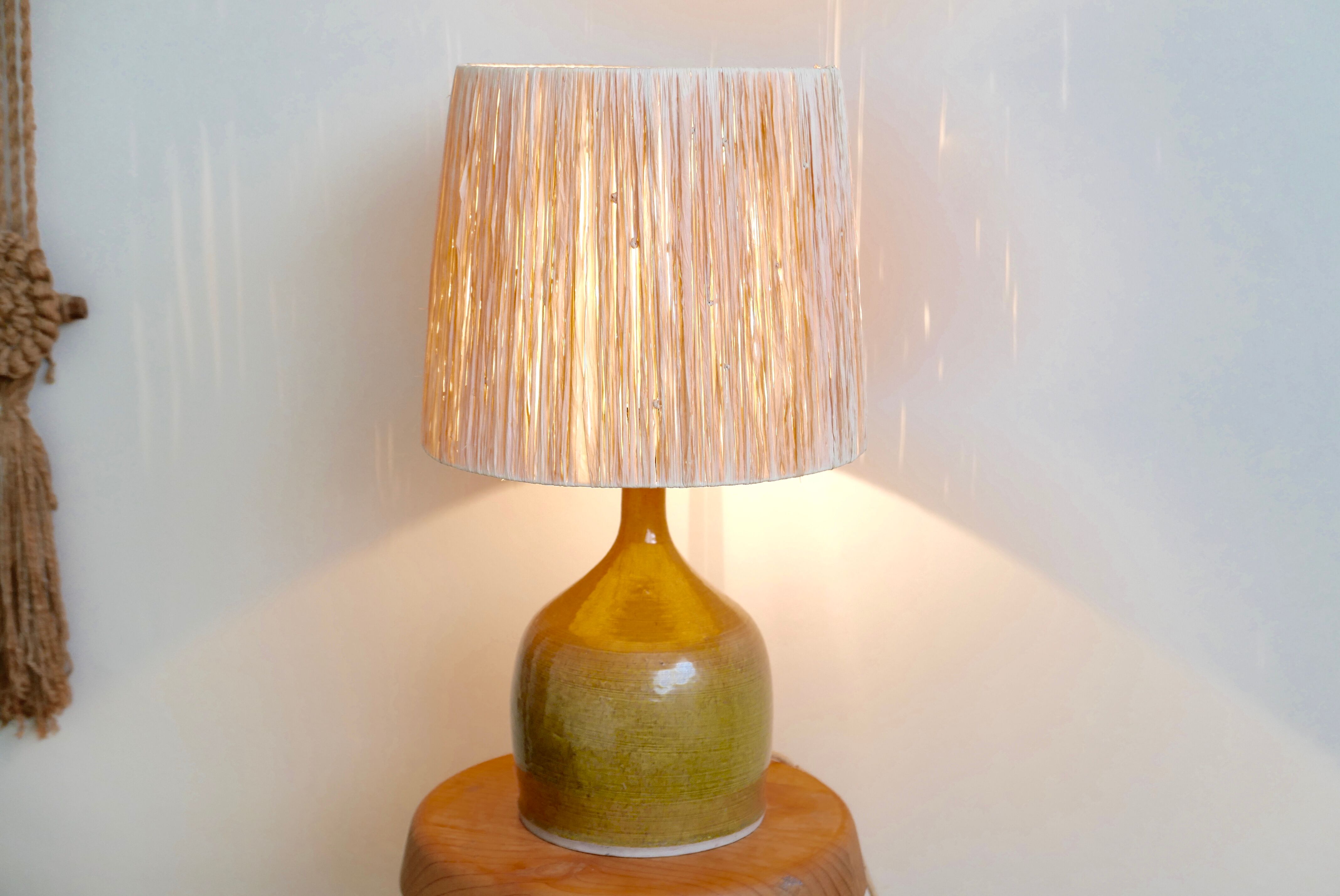 Aniseed green ceramic pottery lamp, raffia lampshade, 70s