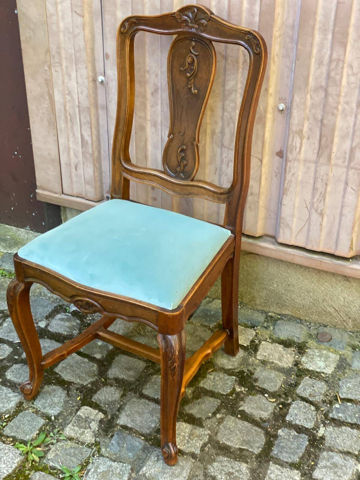 Vintage Louis XV chair made of carved solid wood with blue velvet fabric.