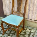 Vintage Louis XV chair made of carved solid wood with blue velvet fabric.