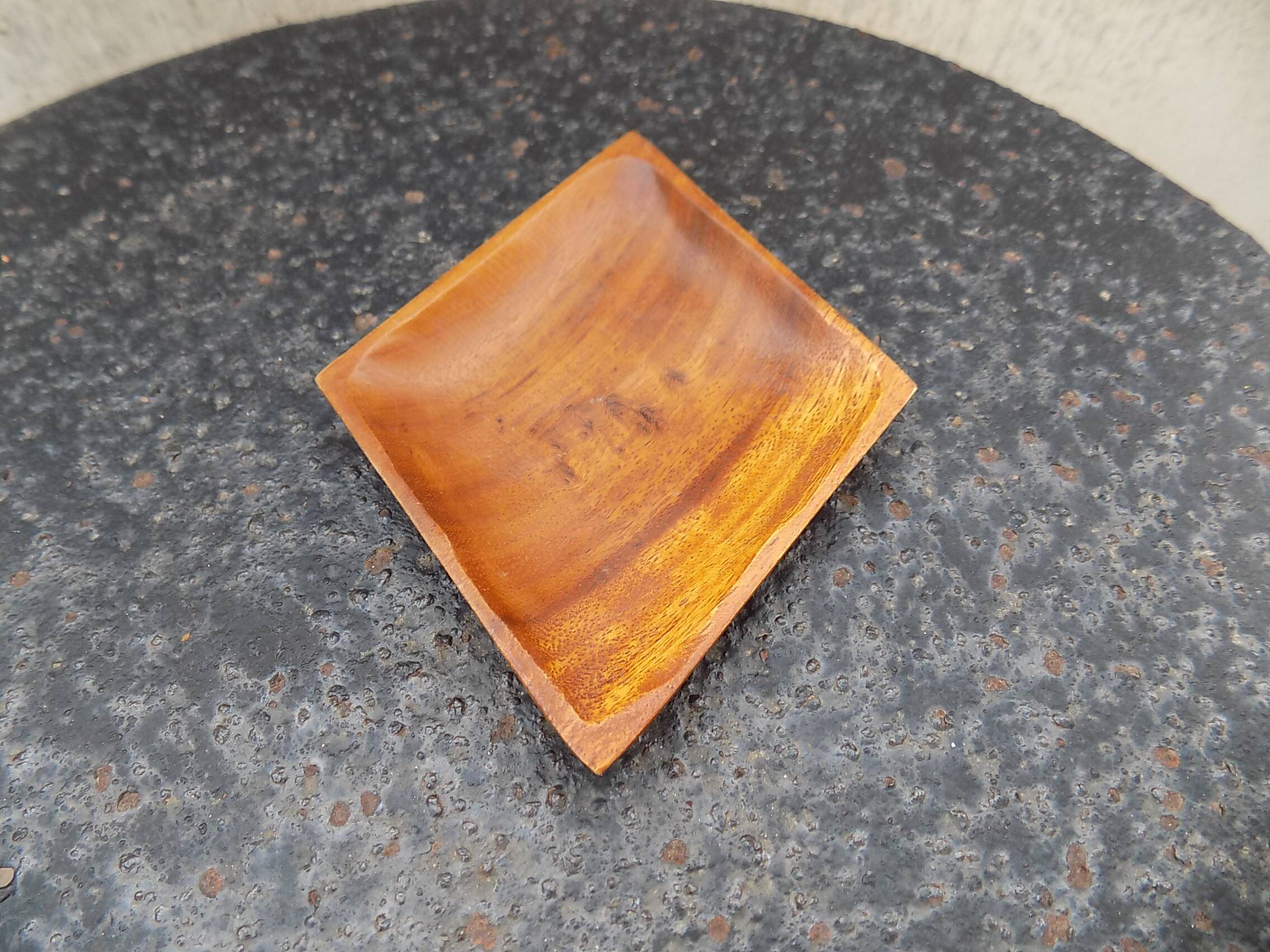 wooden pocket emptier