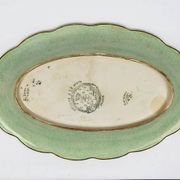 Longwy cup in cloisonné enamels on a green background, polychrome floral decoration and gold