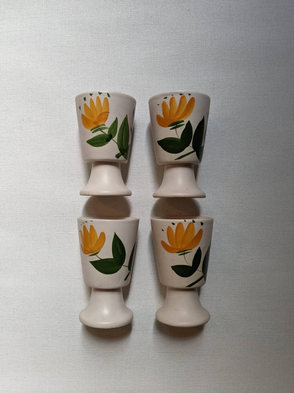 Ceramic mazagran with hand-painted floral decoration.
