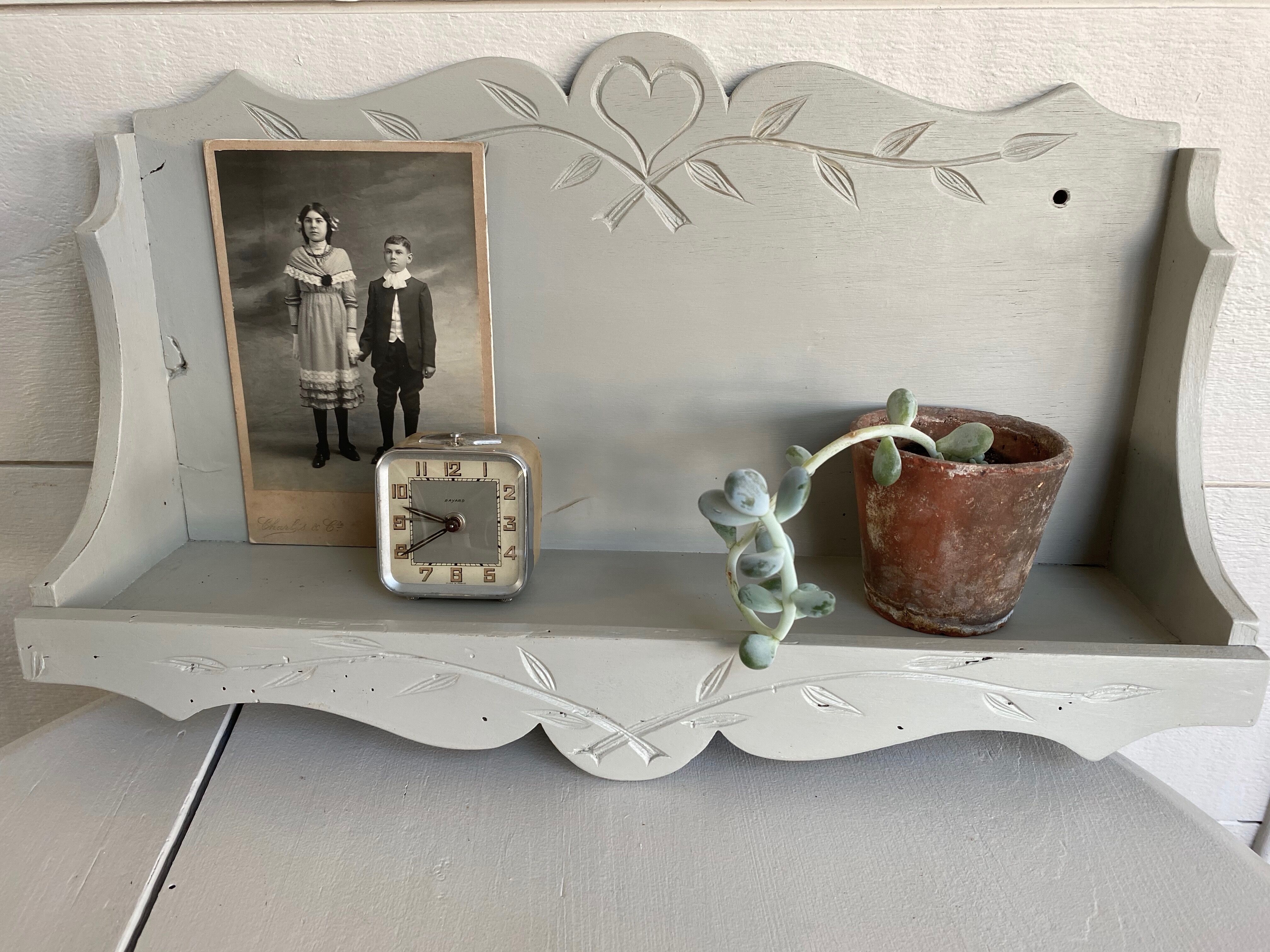 Scalloped wooden shelf
