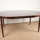 Danish extendable dining table in Rio Rosewood model 55 by Arne Vodder for Sibast 1958.