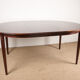 Danish extendable dining table in Rio Rosewood model 55 by Arne Vodder for Sibast 1958.