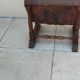 Vintage magazine rack in oak and antique leather