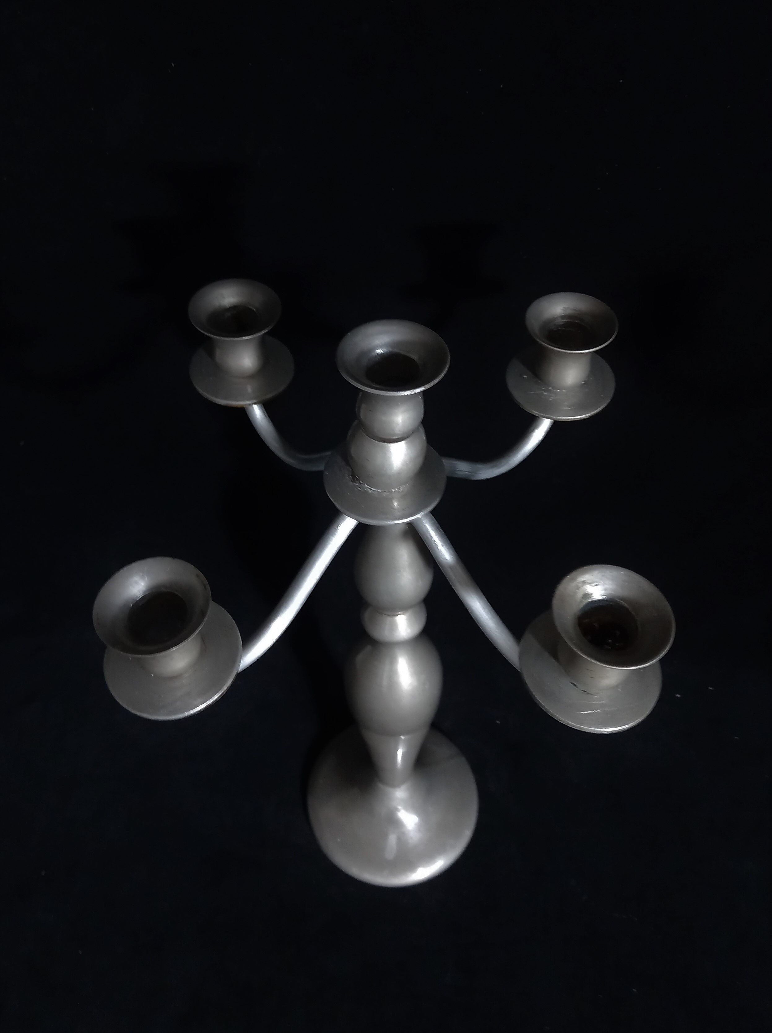 Metal candelabras with five arms