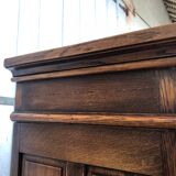 Spanish furniture with carved wood profiles and coats of arms from the 1950s.