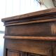Spanish furniture with carved wood profiles and coats of arms from the 1950s.