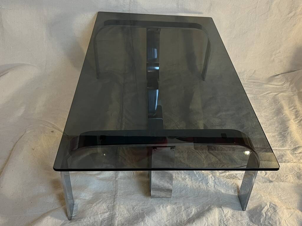 Vintage coffee table from the 70s in chrome and smoked glass, Space Age and Mid-Century style.
