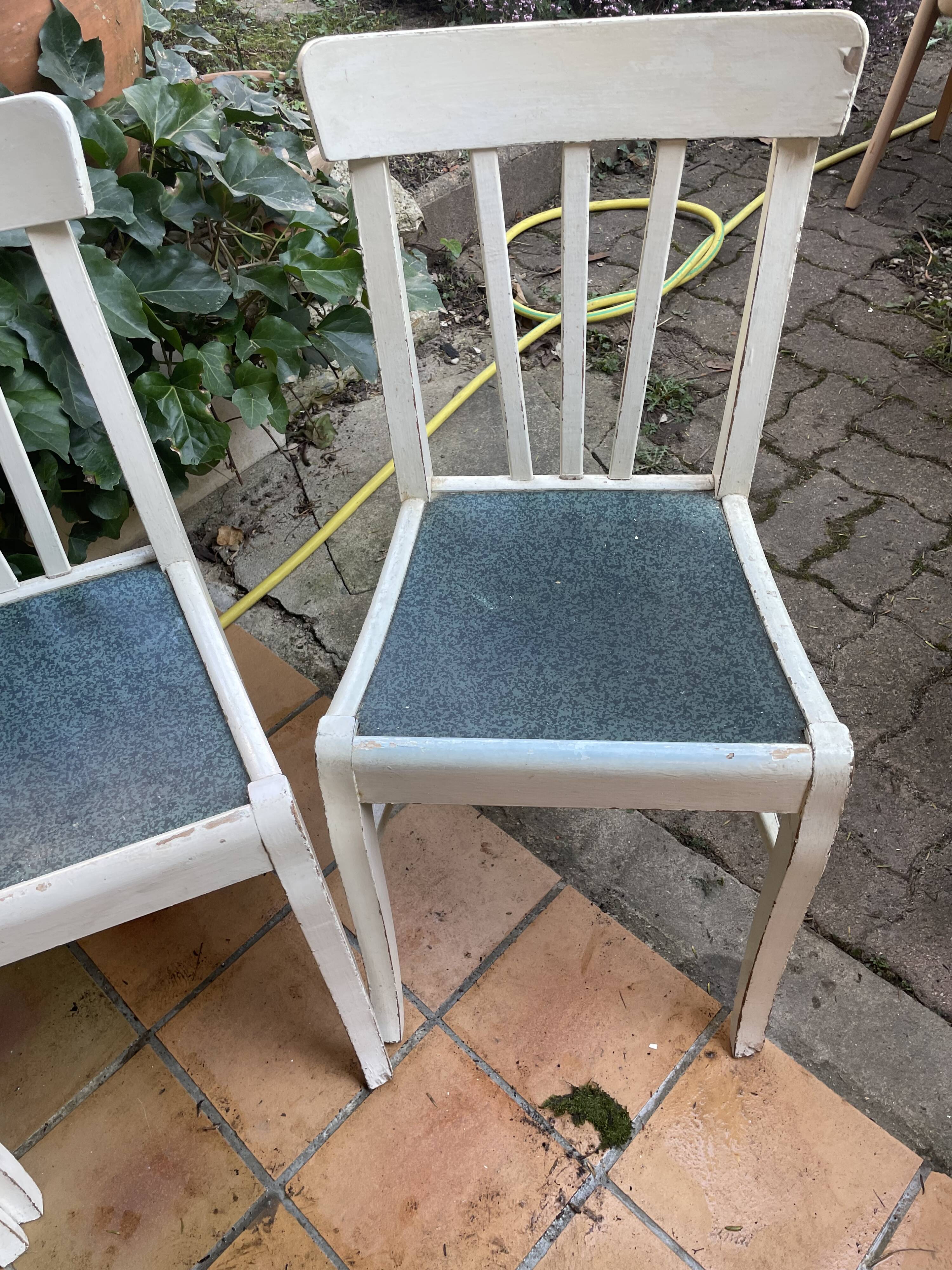 Four original 50 year retro white chairs