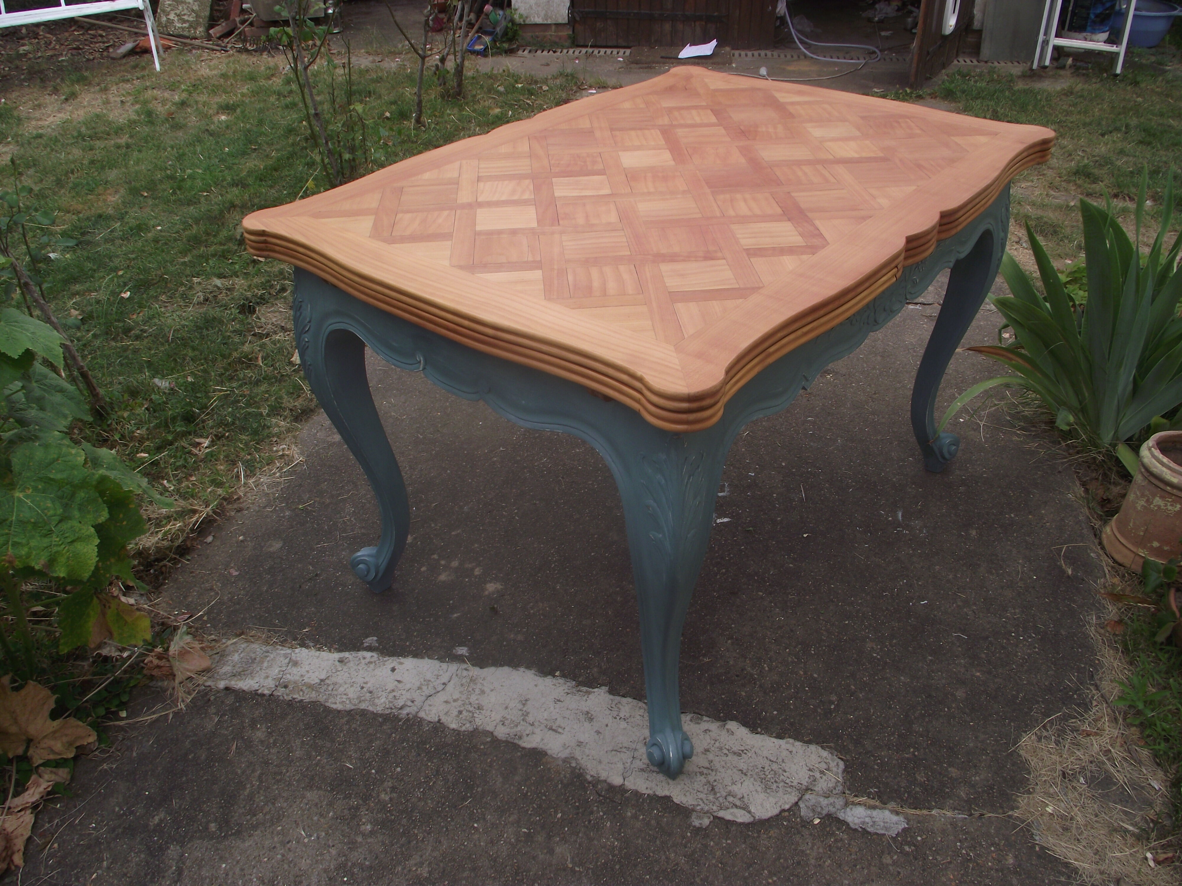 Louis XV-style extension table in solid cherry.