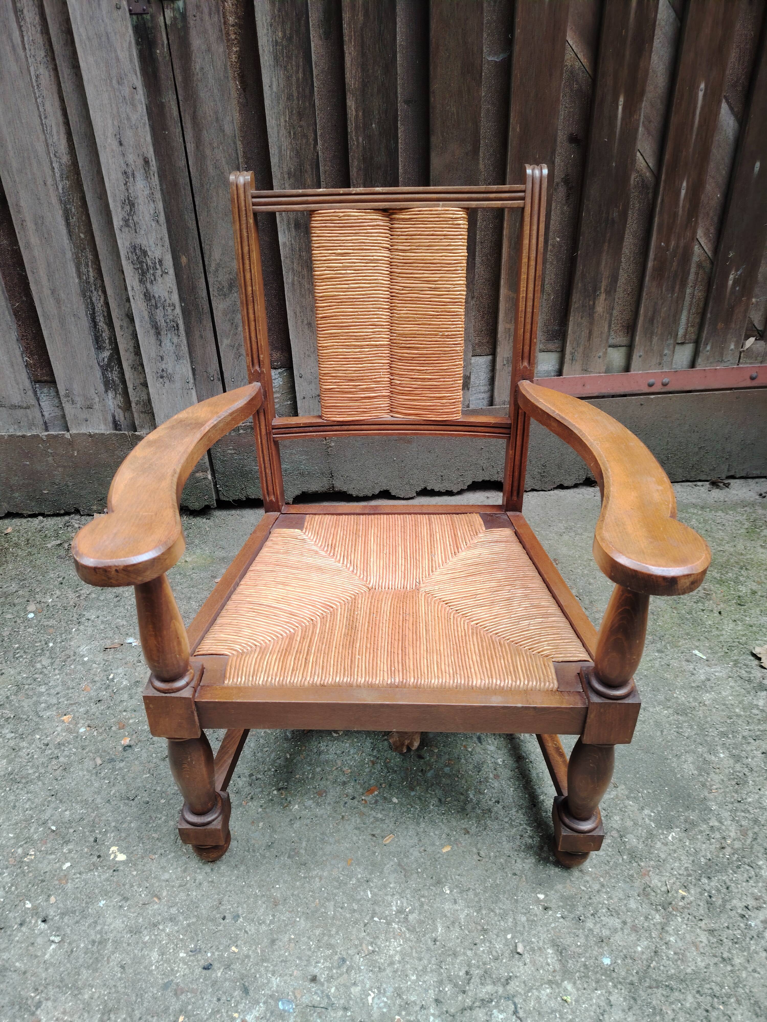 Solid wood and straw armchair