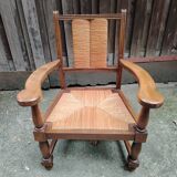Solid wood and straw armchair