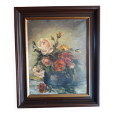Antique oil painting depicting a bouquet of roses