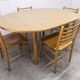 Danish ensemble transformable table 114 cm / 154 + 4 modernist chairs from the 1970s.