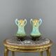 Pair of Art Nouveau vases in glazed ceramic with floral decoration, 20th Century