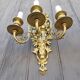Pair of antique bronze wall sconces from the Napoleonic III era in the Louis XVI style.