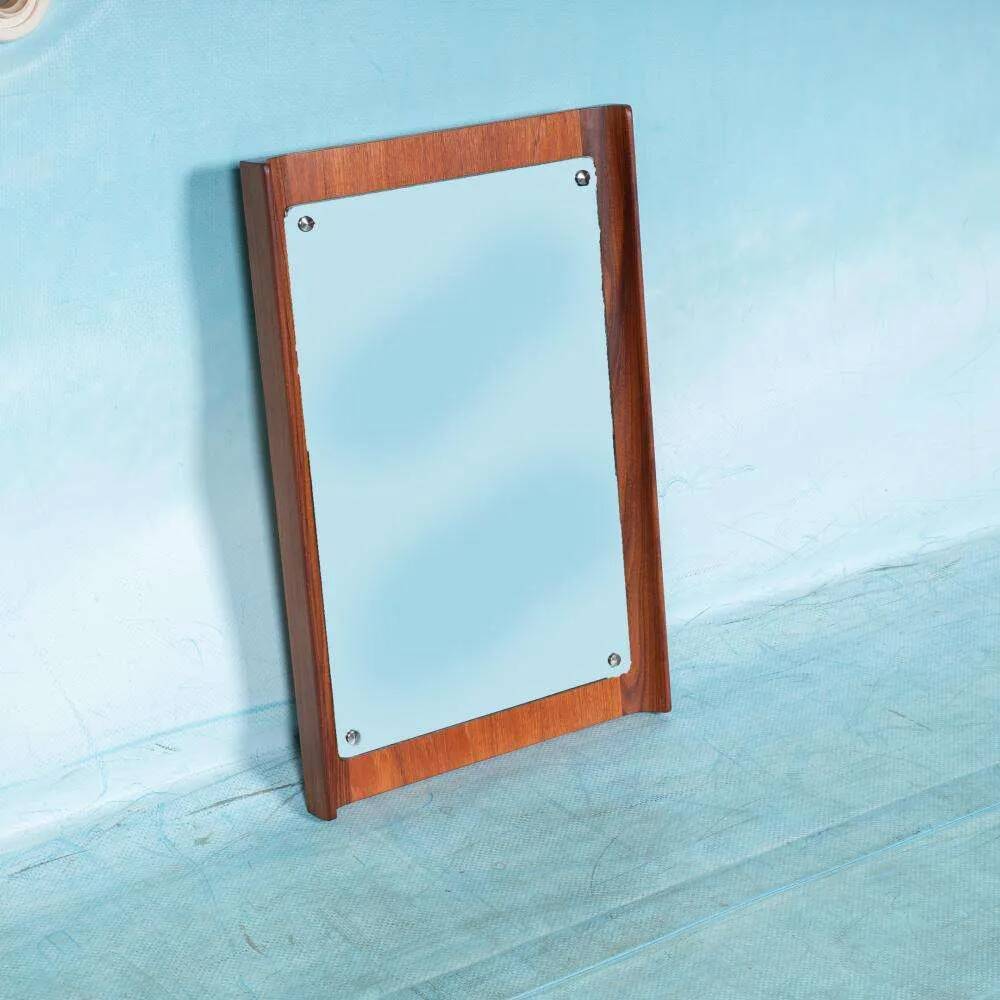 Minimalist Scandinavian mirror in teak with a vintage design.