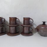 coffee service in iridescent stoneware cups and vintage sugar bowl