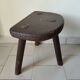 Antique tripod milking stool in solid wood – rustic & patina