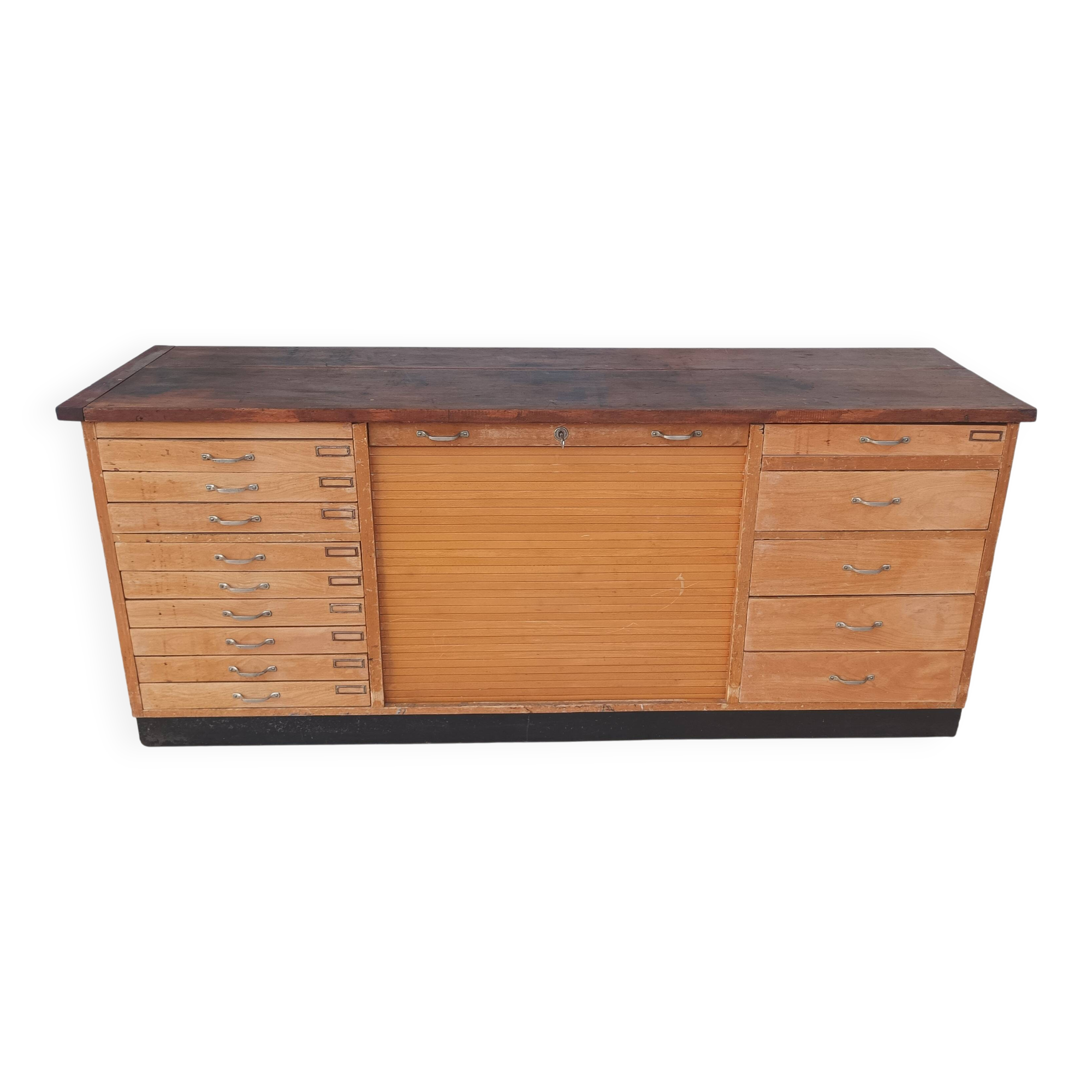 Workshop furniture with drawers and curtain in beech and walnut.