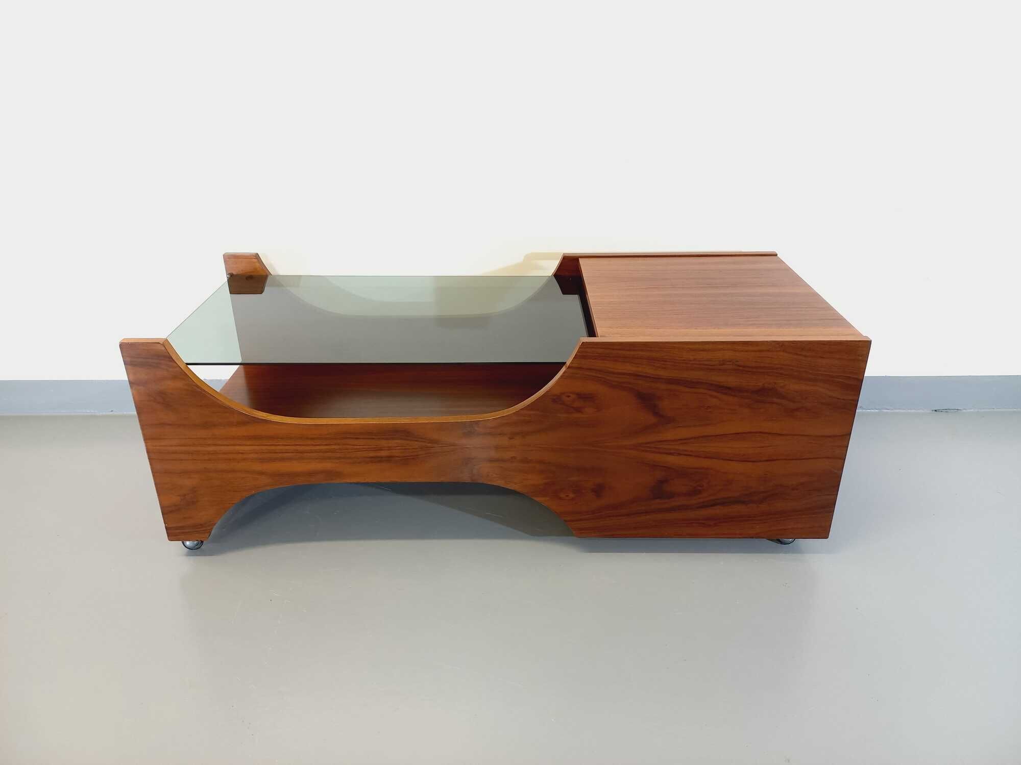 Vintage bar coffee table on rosewood wheels and smoked glass from the 60s