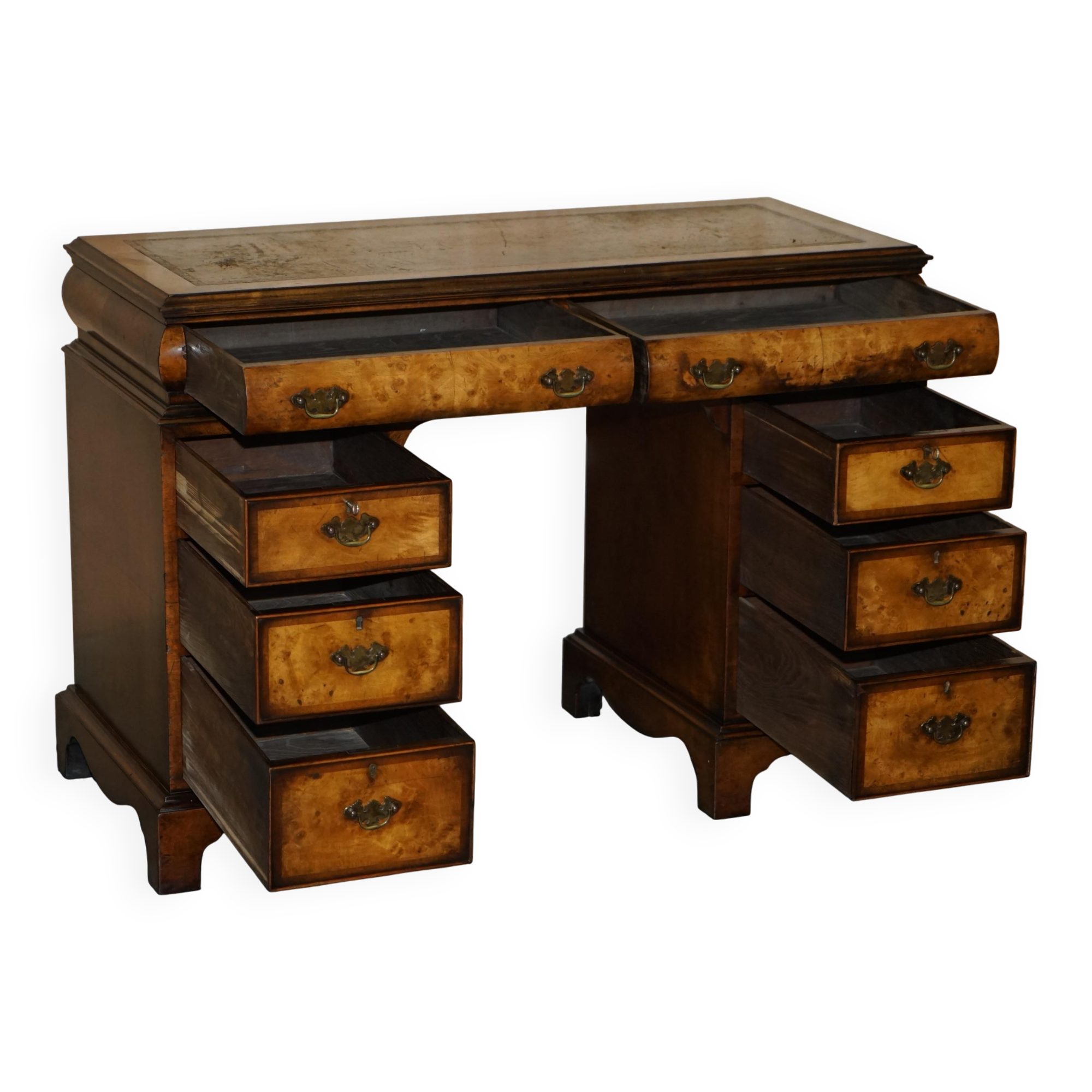 Victorian antique partner's desk in veined walnut with a leather top.