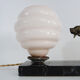 Lamp, Art Deco night light, dog on black marble base, pink globe. Year 30