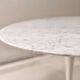 Round table in Carrara marble by Eero Saarinen for Knoll