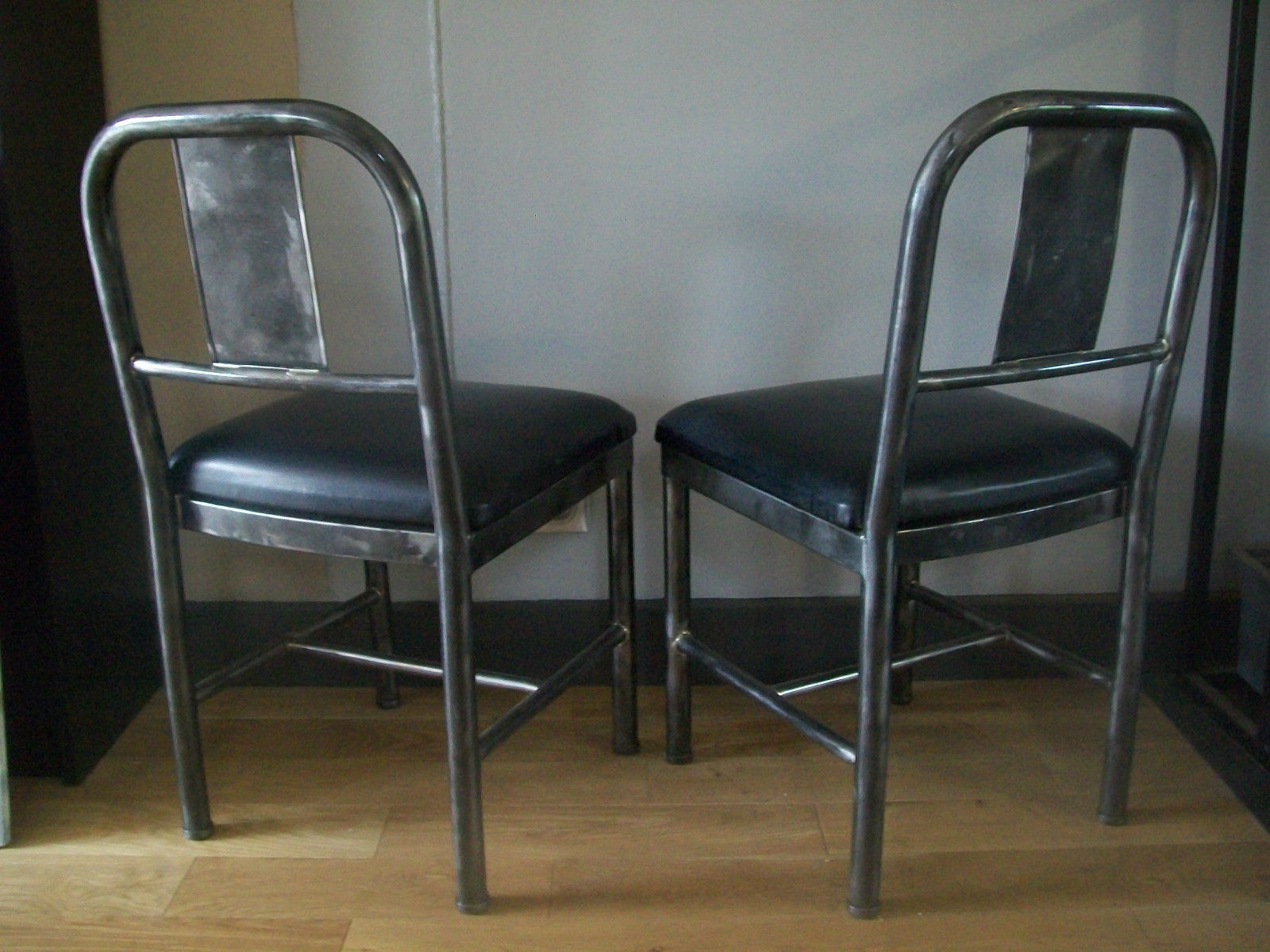 Pair of metal and industrial design leatherette chairs