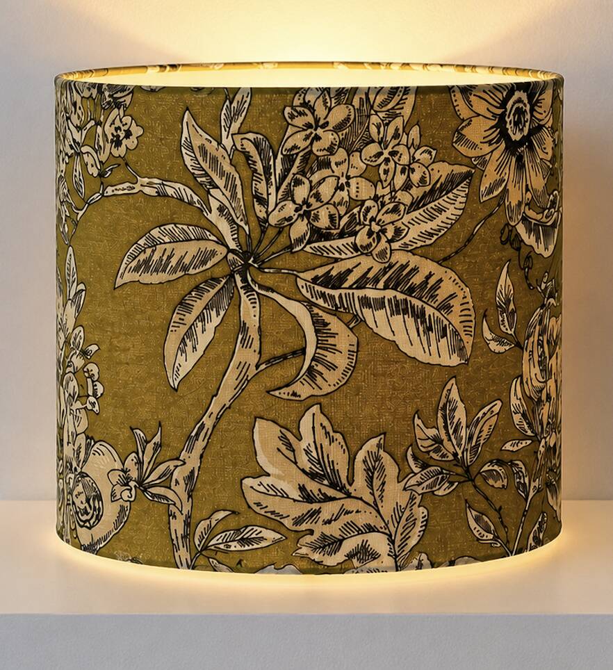 Lampshade dressed in a modern tropical-inspired pattern blending