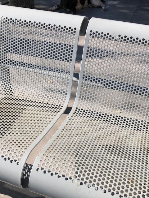 Perforated metal garden bench