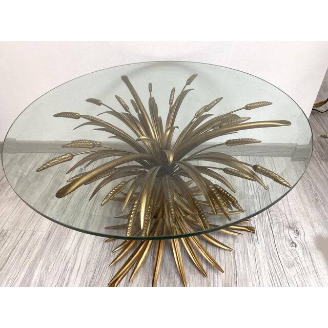 Old gold florentine wrought iron ears cofee table