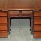 Partner desk with two carved columns featuring lion heads, according to Thomas Chippendale, restored.