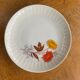 6 small porcelain plates and vintage orange and yellow flowers