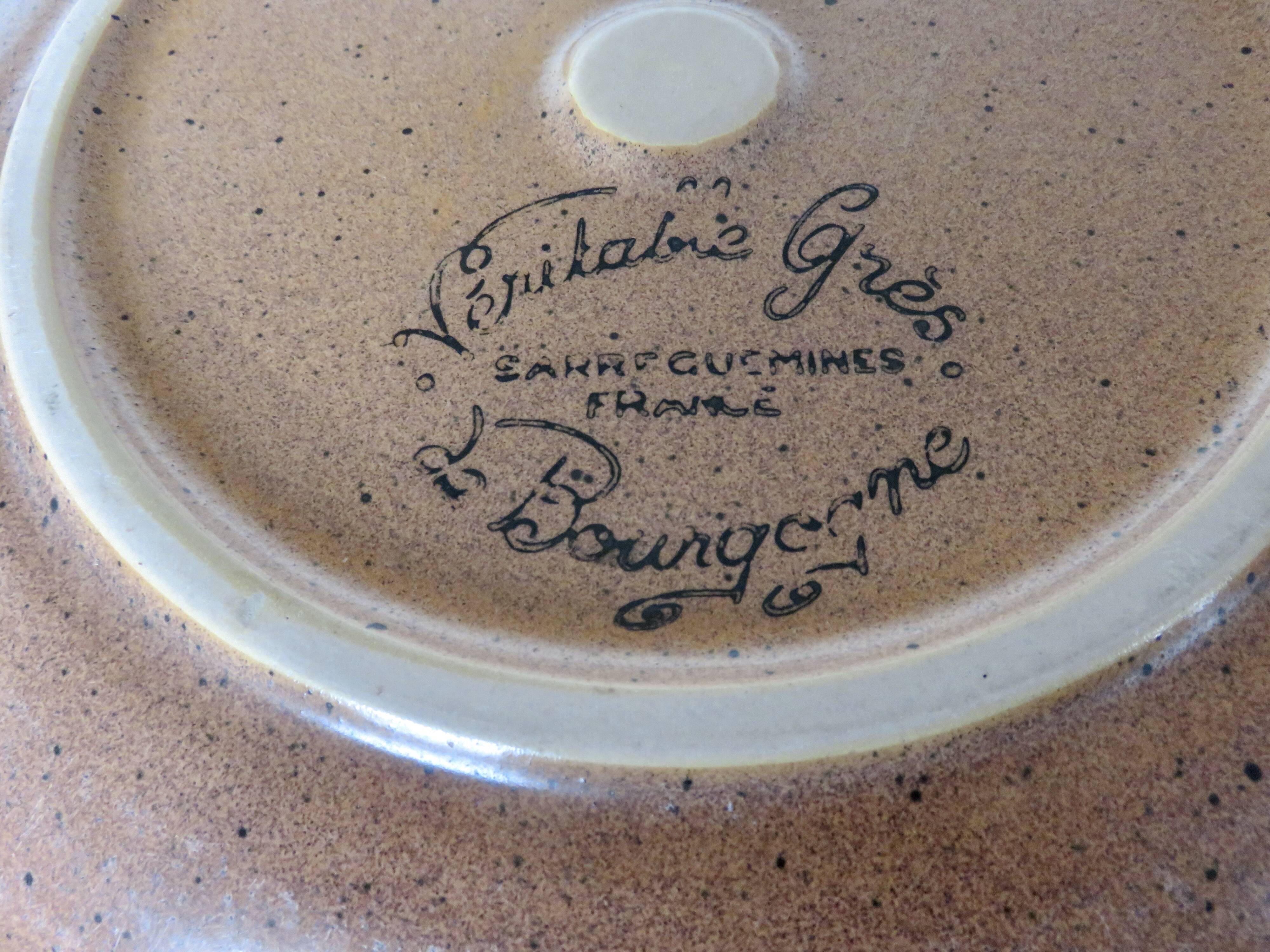 Large earthenware dish, slipware finish, Sarreguemines, France.