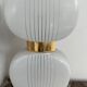 Pair of vintage wall lights from the 60s-70s in striped opaline glass and gilded brass.