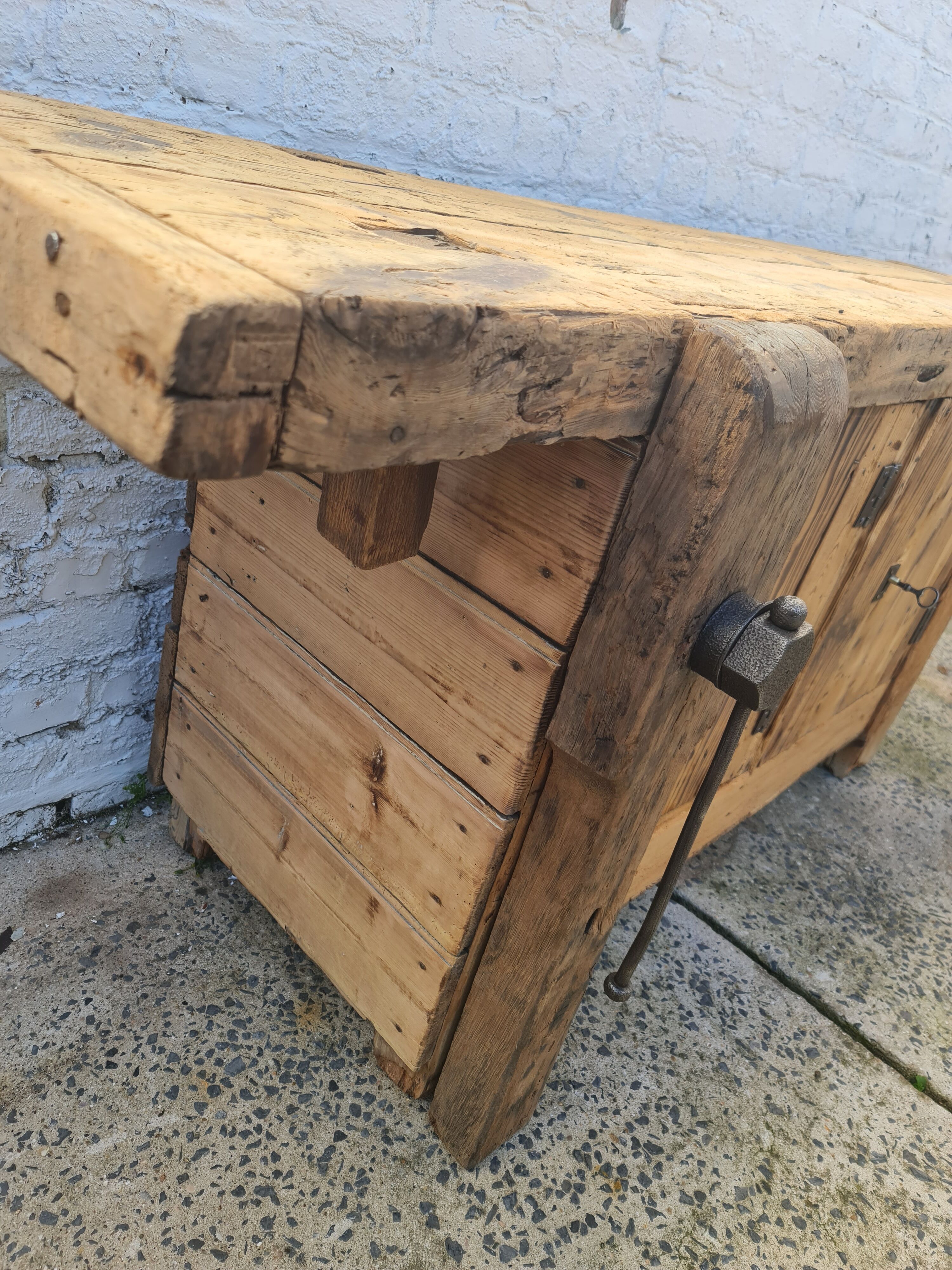 Old two-door fir workshop workbench