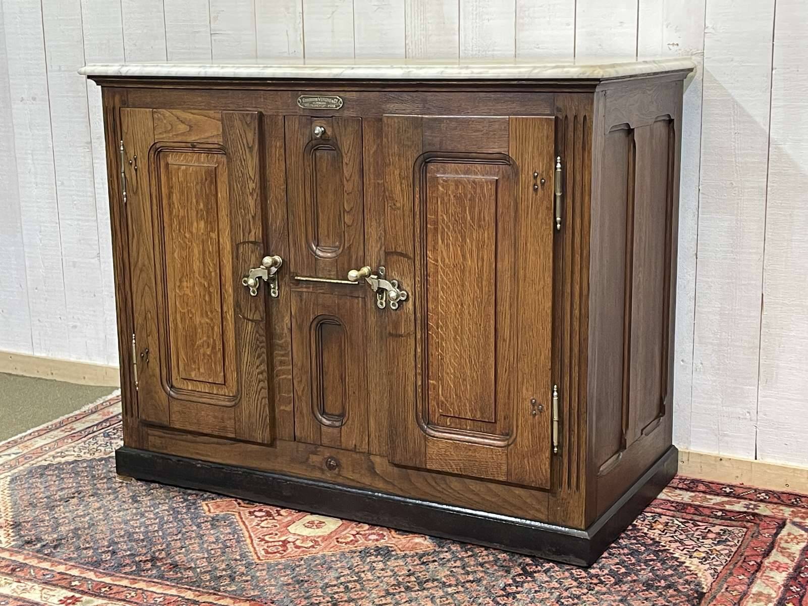 Glacière début XXème en chêne et dessus marbre