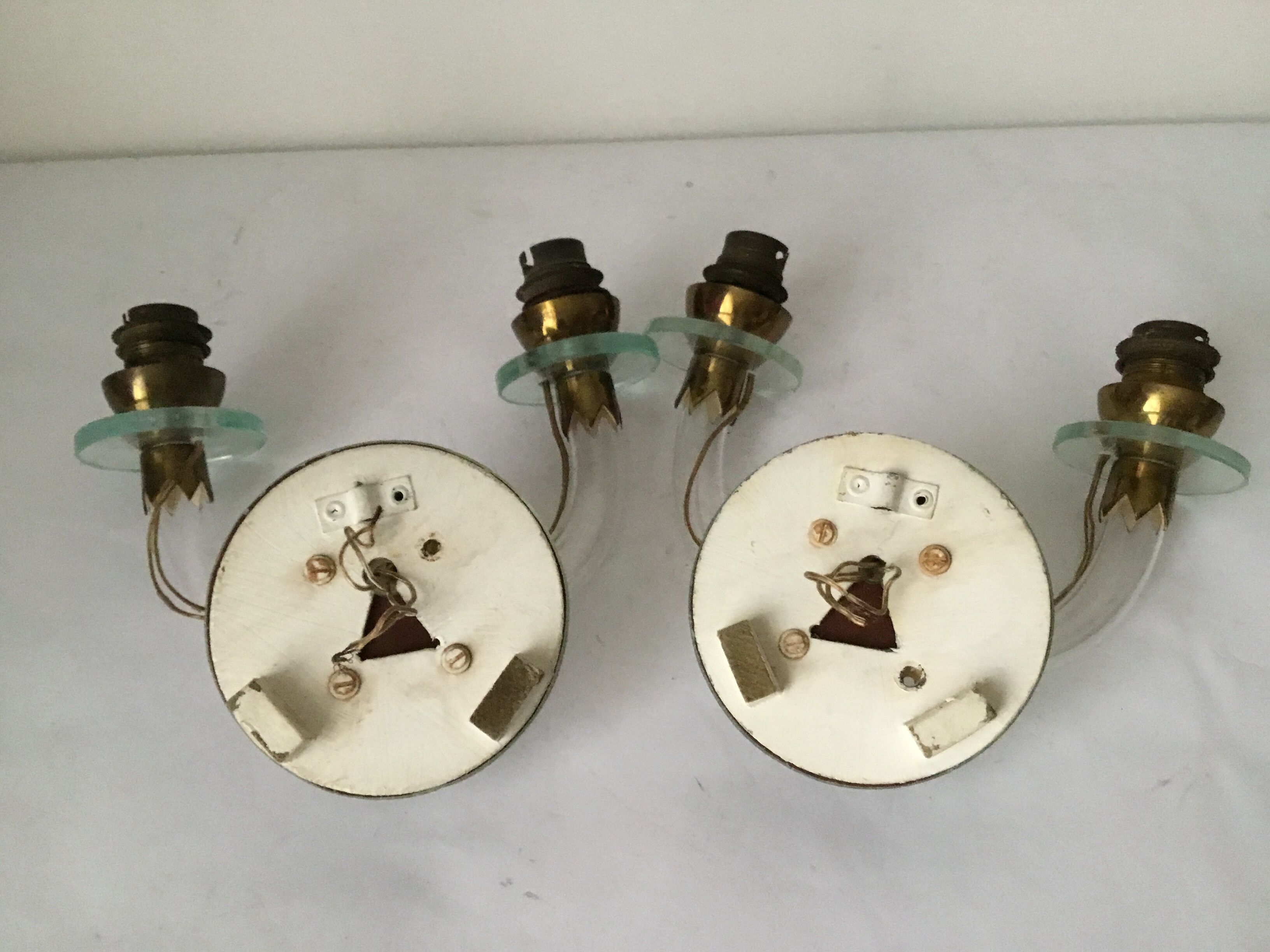 Pair of glass and mirror sconces