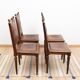 Set of 4 Louis XVI style chairs in carved wood and embossed leather.