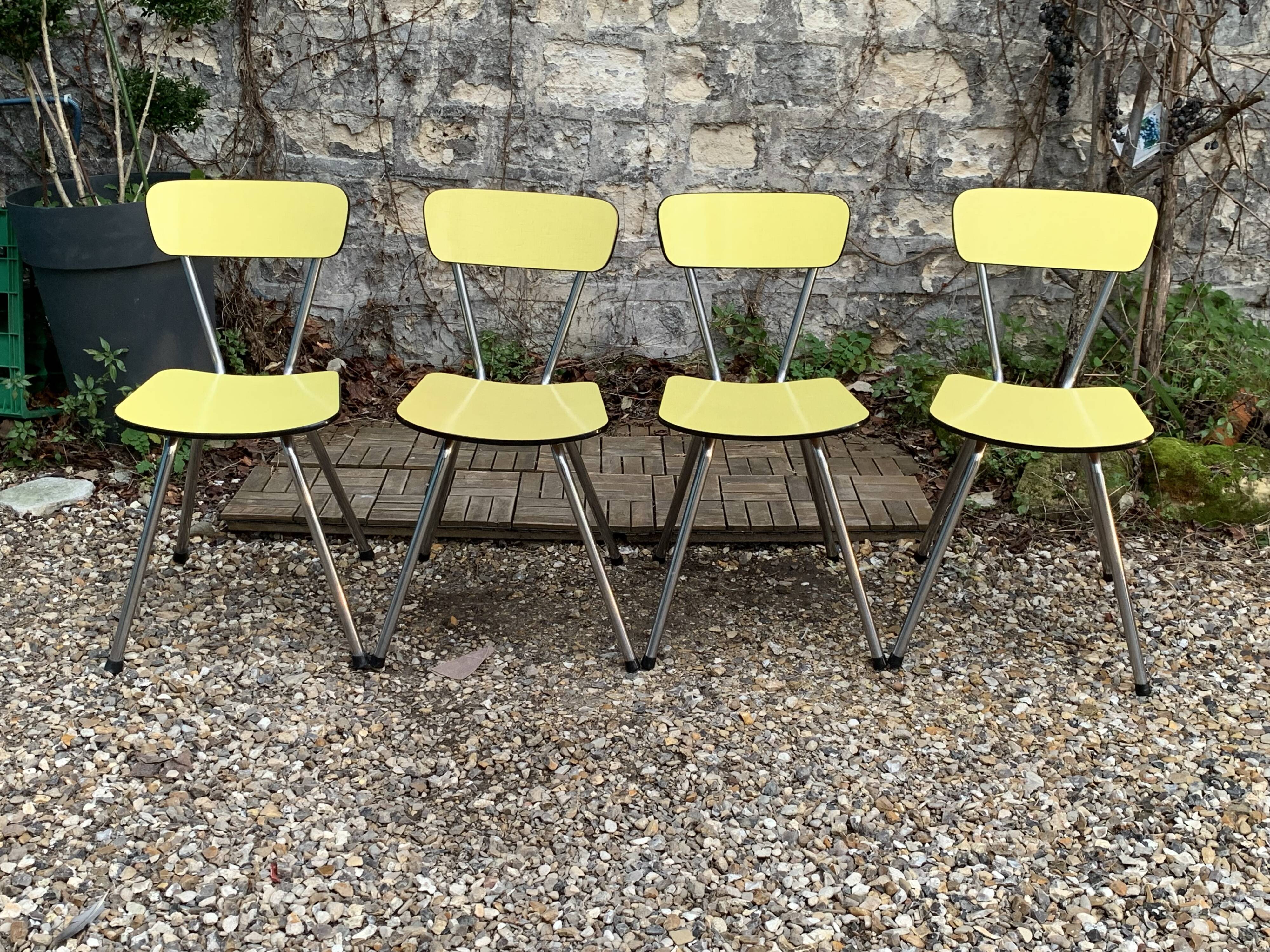 Yellow Formica chairs with compass legs, 1950s