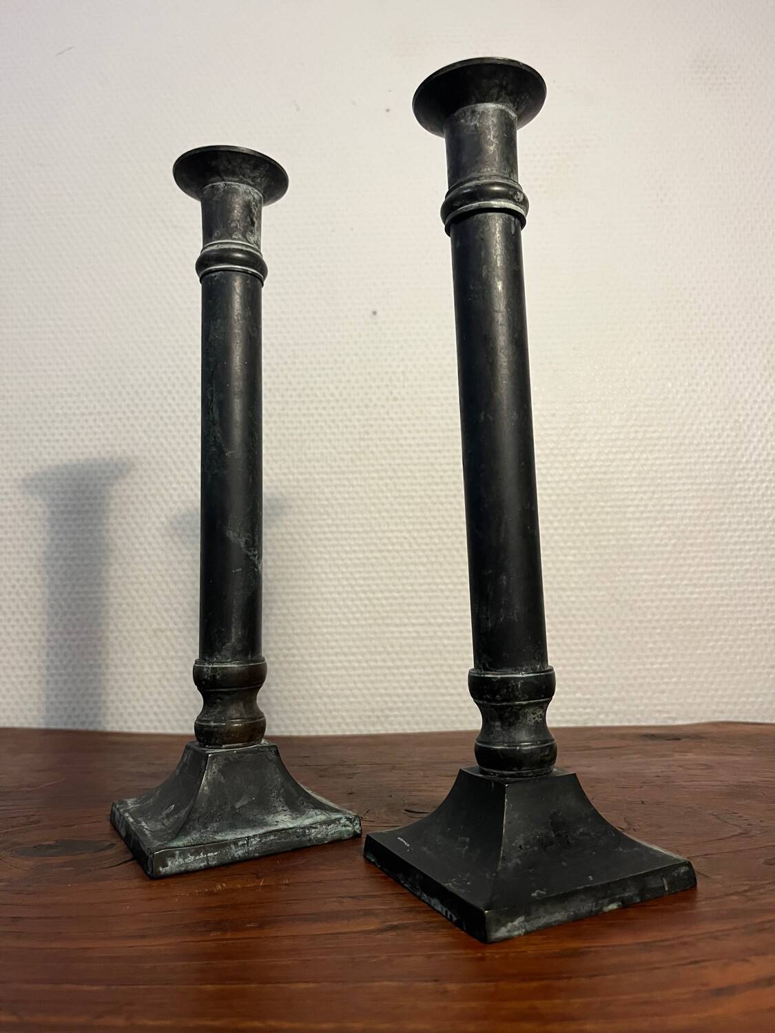 Pair of removable patinated brass candlesticks